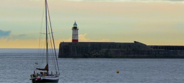 Newhaven lighthouse with yacht